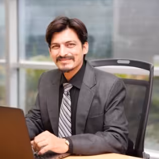 AZIZ J. BADAMI