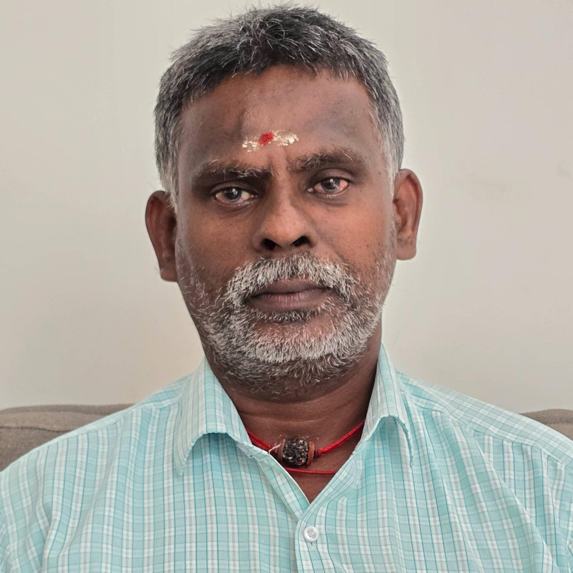 Thangam T
