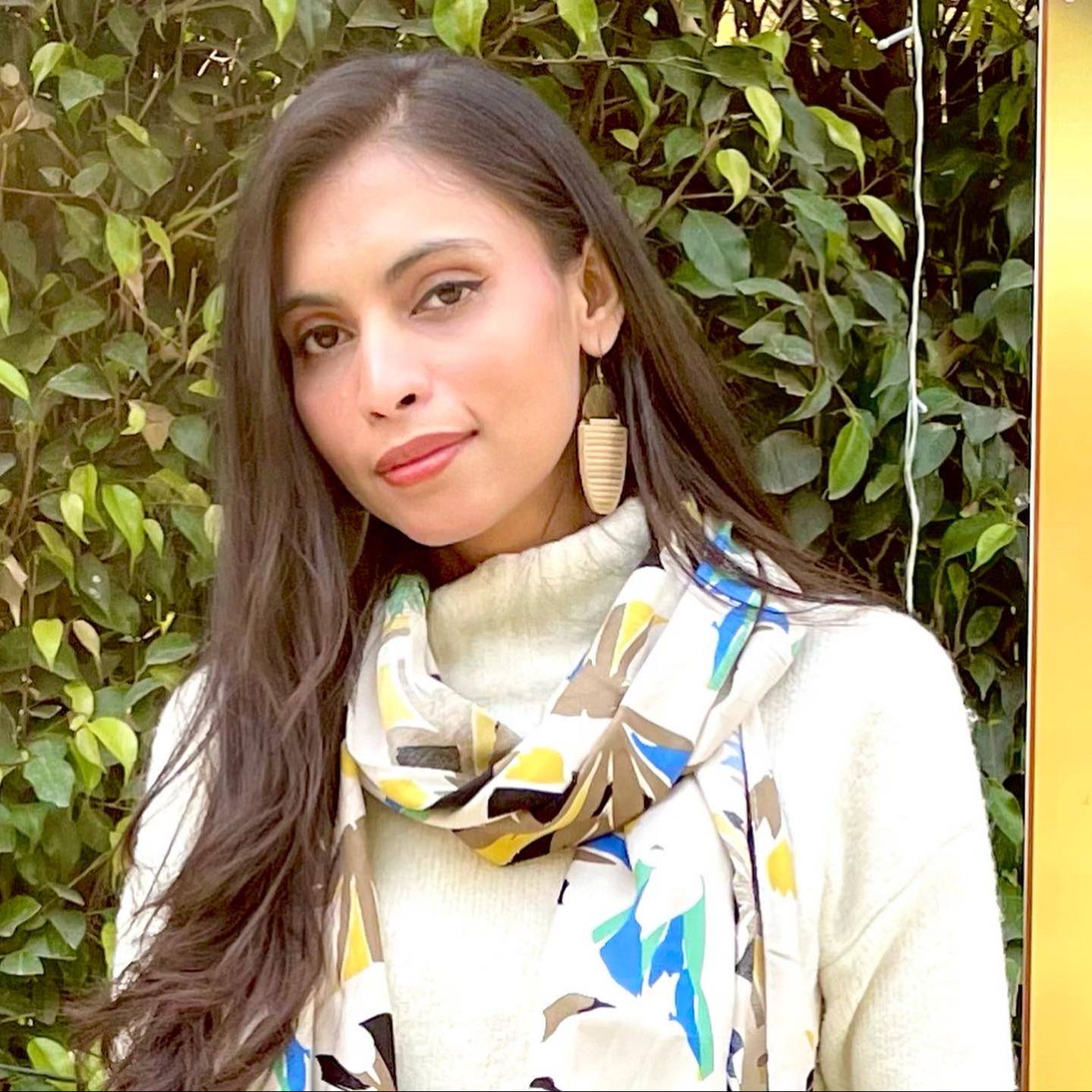 NAGHMI MALIK