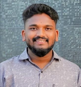 Purushothama A