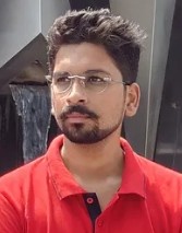 Ajay B
